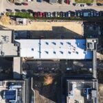 Obraz ilustruje budynek Archiwum Państwowego w Katowicach po zakończeniu prac renowacyjnych pokrycia dachu w systemie Hyperdesmo